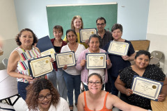 Students from the Catholic Charities English as a Second Language (ESL) Program celebrate their end-of-the-year milestones at Corpus Christi Church in Woodside, Queens.