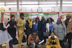 Members, volunteers and staff of the Catholic Charities Ozone Park Older Adult Center gather for a group photo during their annual Christmas party.